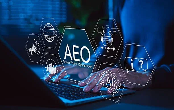 freelance digital marketing specialist in kannur sits on laptop and does AEO.